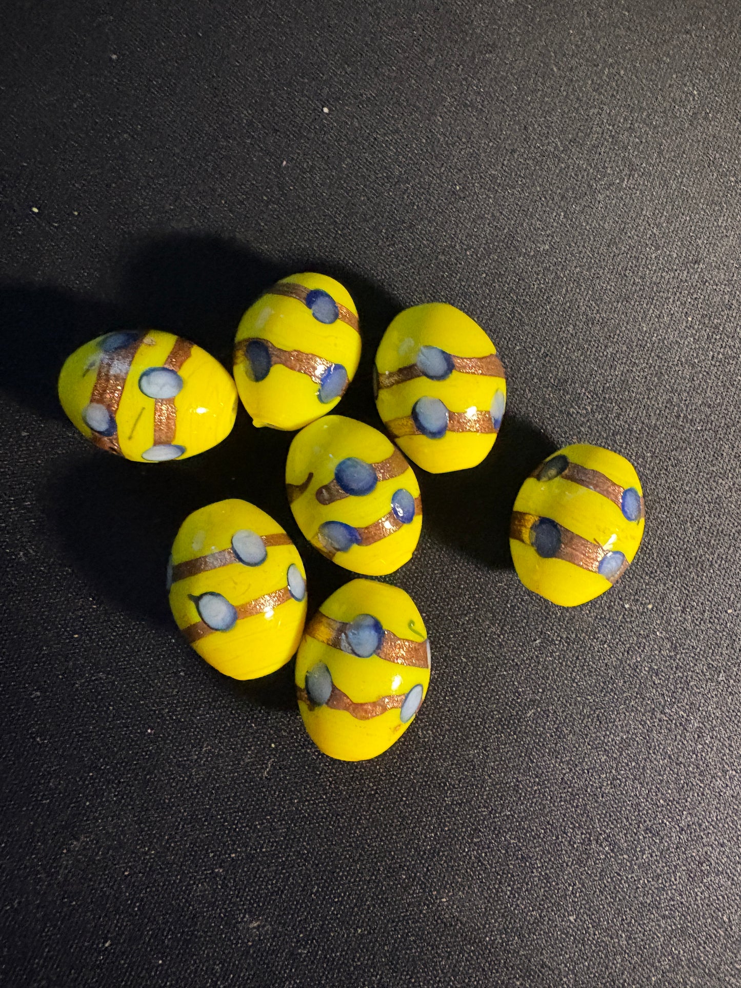 7 Large oval glass beads - Fancy Yellow Eclectic - gold foil blue dot (S06)