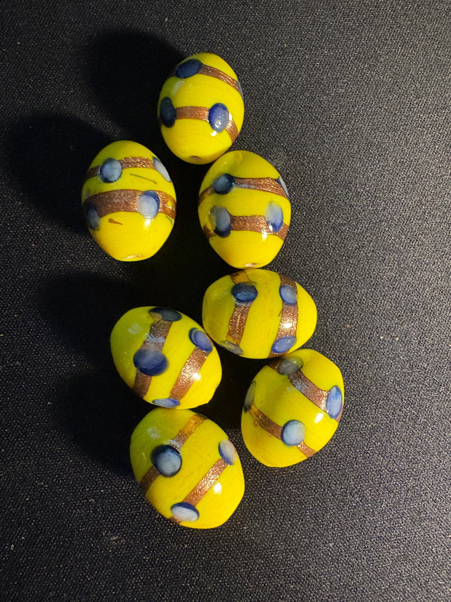 7 Large oval glass beads - Fancy Yellow Eclectic - gold foil blue dot (S06)