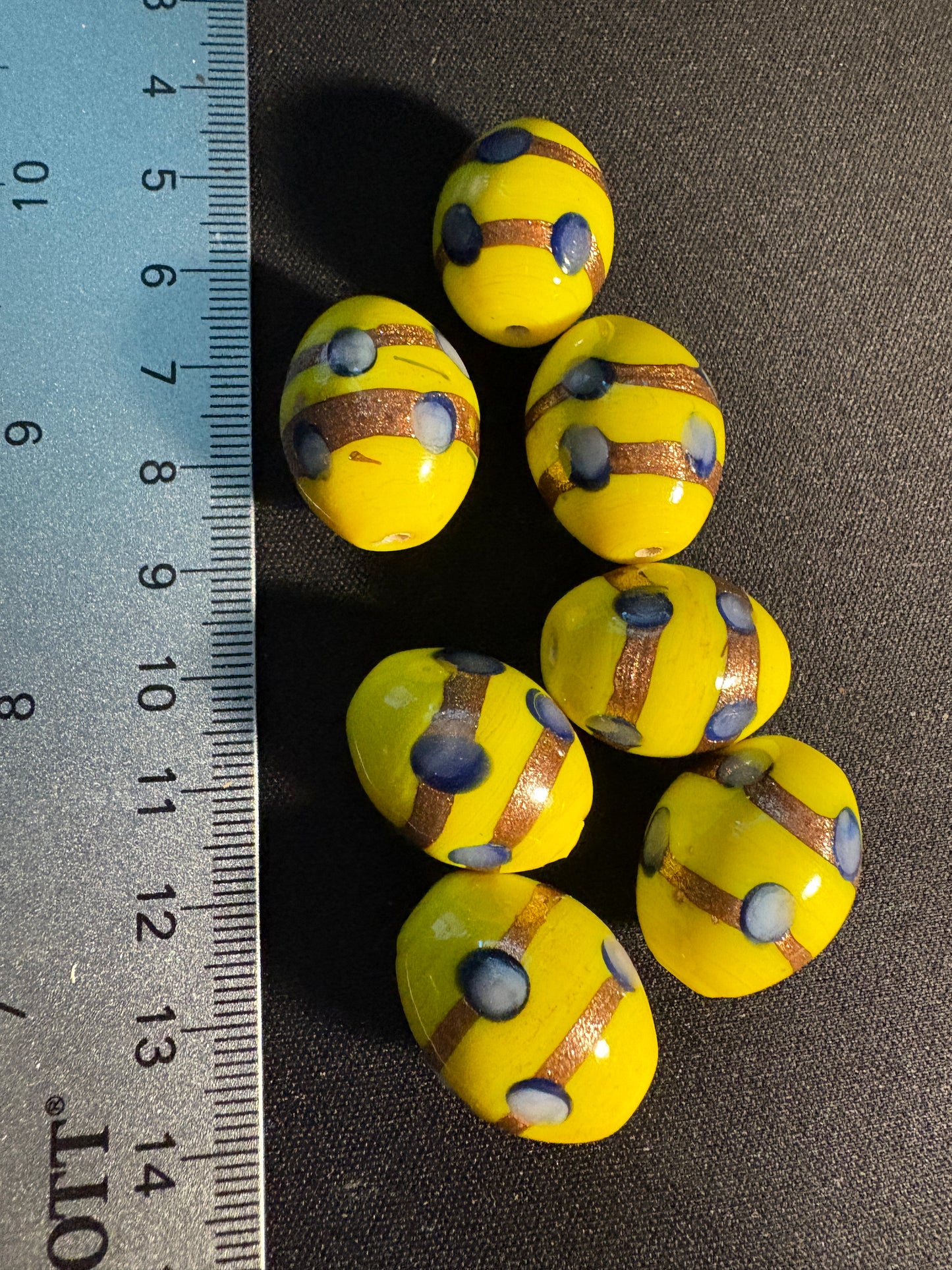 7 Large oval glass beads - Fancy Yellow Eclectic - gold foil blue dot (S06)