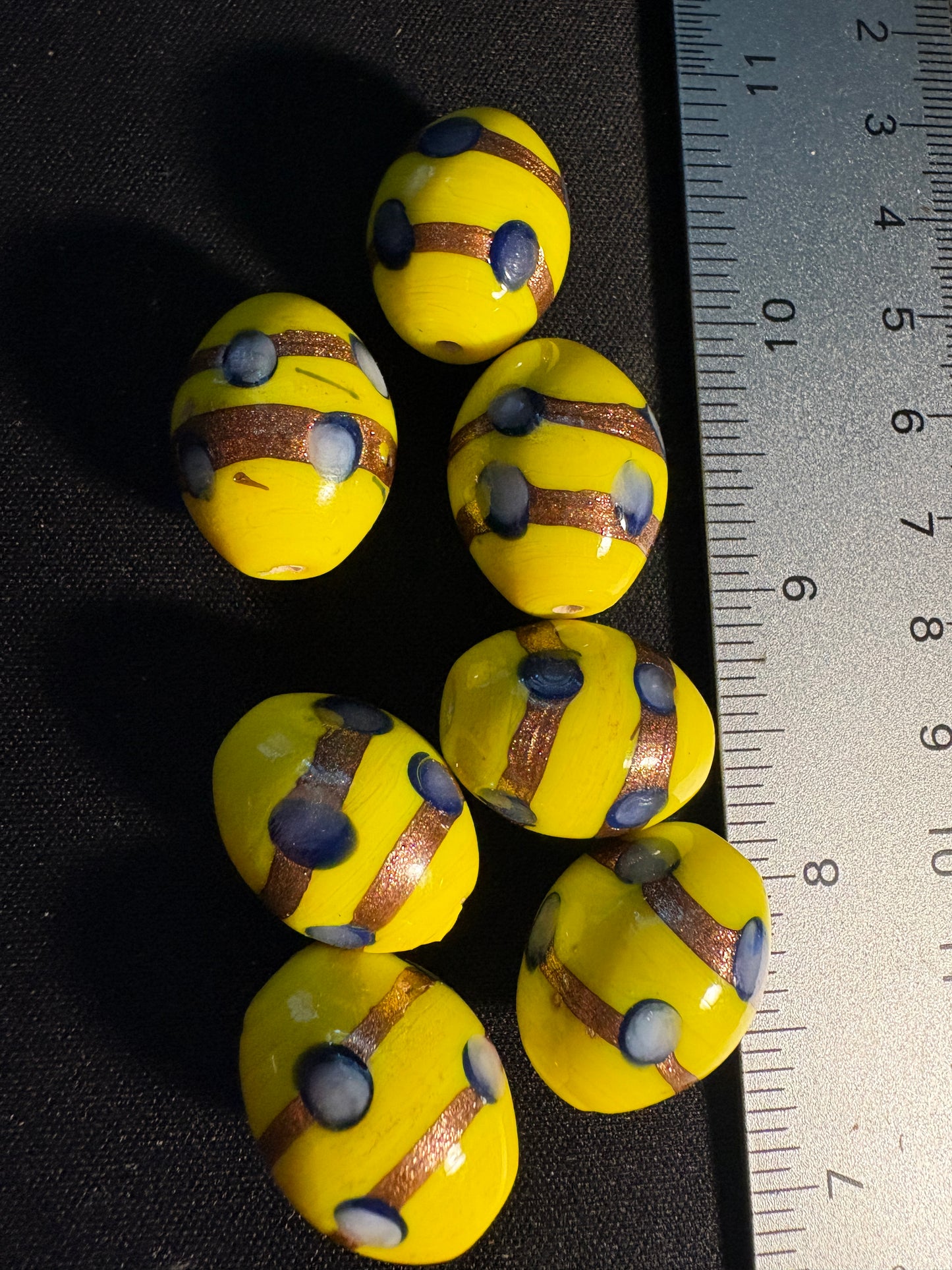 7 Large oval glass beads - Fancy Yellow Eclectic - gold foil blue dot (S06)