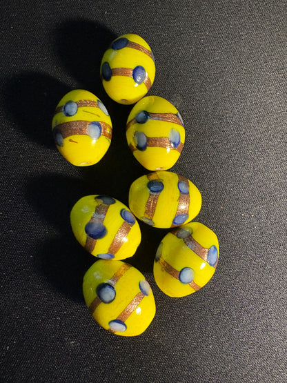 7 Large oval glass beads - Fancy Yellow Eclectic - gold foil blue dot (S06)