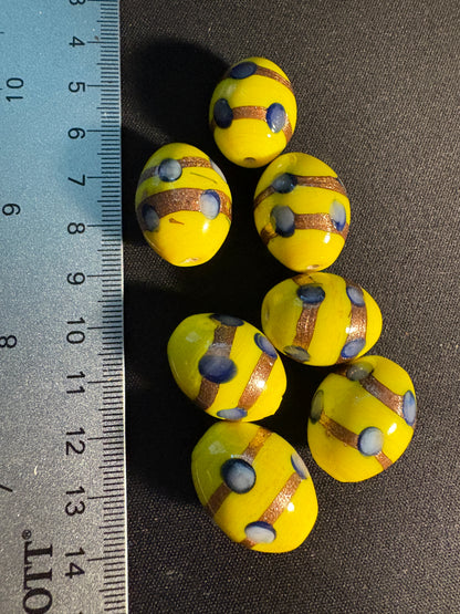 7 Large oval glass beads - Fancy Yellow Eclectic - gold foil blue dot (S06)